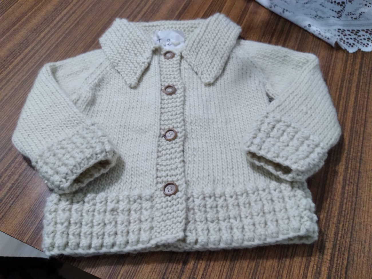 Cardigan celeste con botones — Carmen